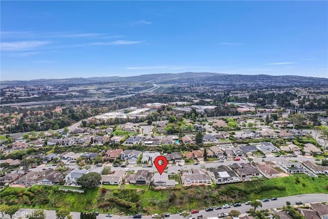bird's eye view with a residential view and a mountain view