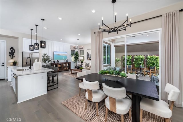 105 Great Park Blvd, Irvine, CA 92618 - dining room with recessed lighting, a chandelier, and dark wood finished floors