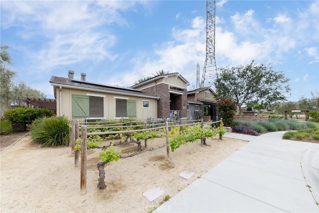 16015 Almond Ave, Chino, CA 91708 - view of front of house with solar panels and fence