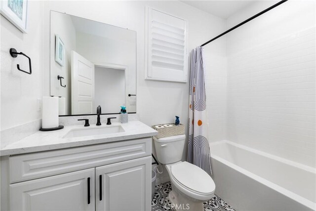 16015 Almond Ave, Chino, CA 91708 - bathroom featuring tile patterned floors, shower / bath combo, toilet, and vanity