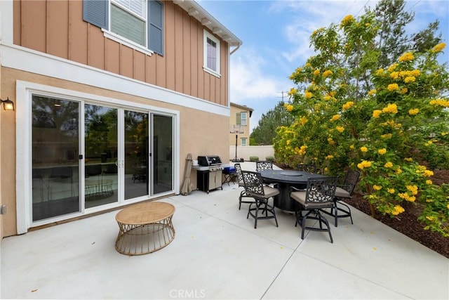 16015 Almond Ave, Chino, CA 91708 - view of patio with outdoor dining space, a grill, and fence