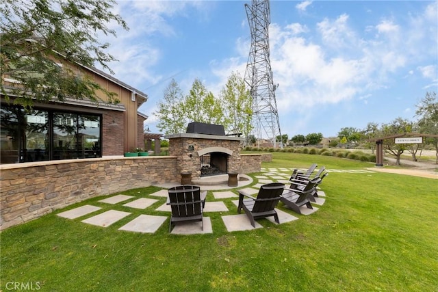 16015 Almond Ave, Chino, CA 91708 - view of yard with a patio and an outdoor stone fireplace