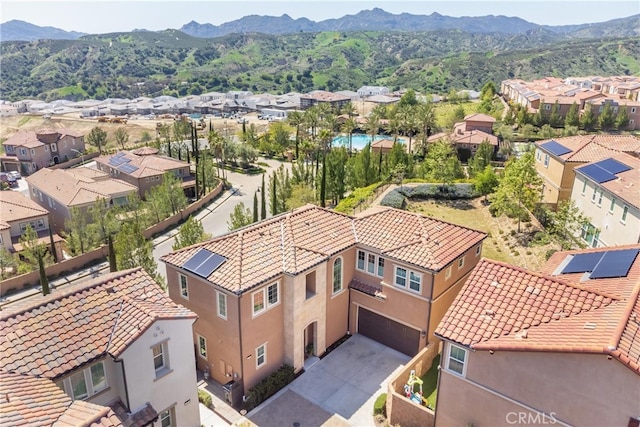 aerial view featuring a mountain view and a residential view