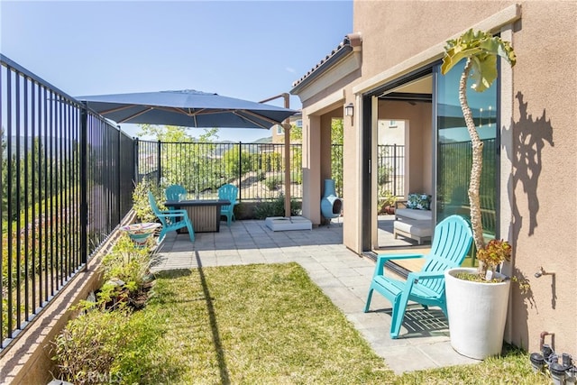 view of patio with fence