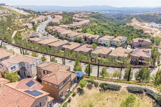 bird's eye view featuring a residential view and a mountain view