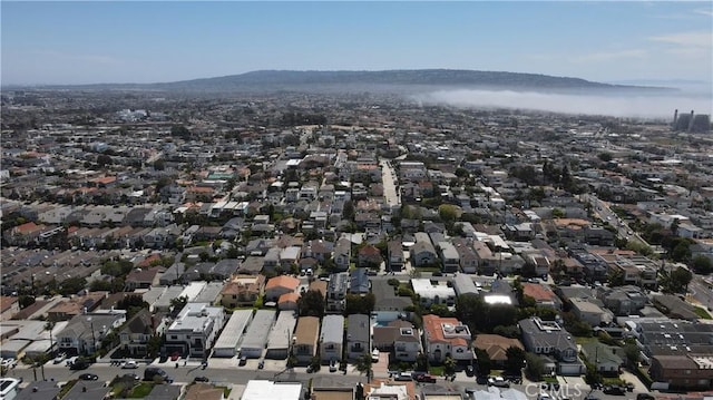 bird's eye view featuring a mountain view and a residential view