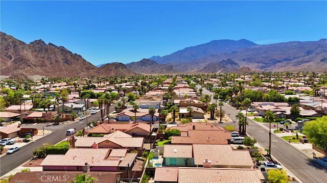aerial view with a mountain view and a residential view