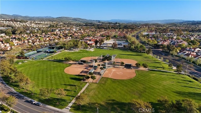 birds eye view of property with a residential view and a mountain view