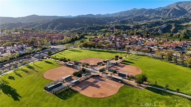 aerial view featuring a mountain view and a residential view