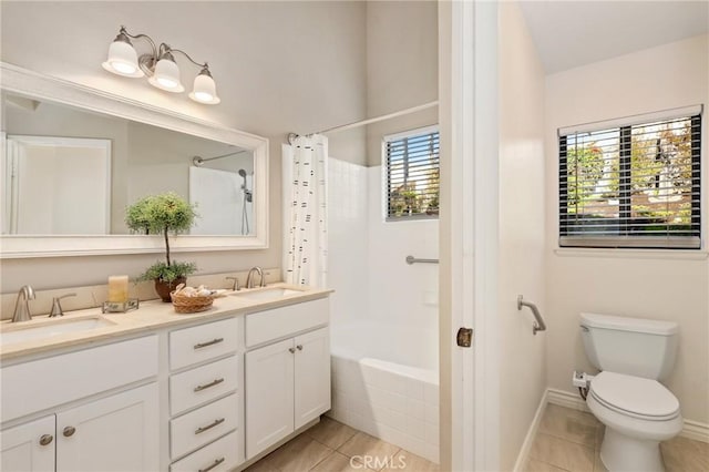 full bathroom with a sink, toilet, and tile patterned flooring