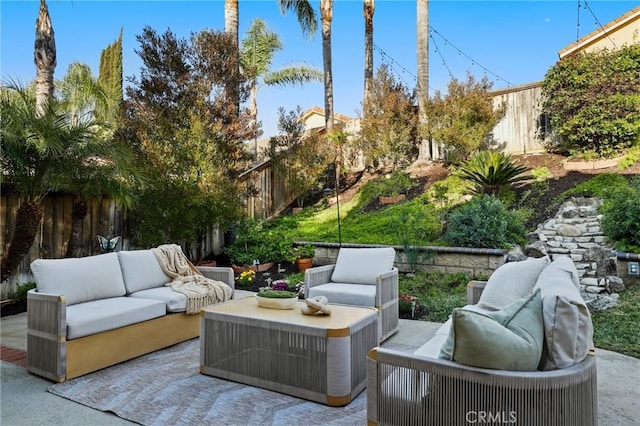 view of patio / terrace featuring a fenced backyard and an outdoor hangout area