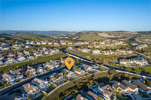 2107 Camino Laurel, San Clemente, CA 92673 - aerial overview of property's location featuring nearby suburban area and a mountainous background