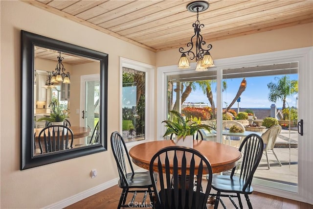 2107 Camino Laurel, San Clemente, CA 92673 - dining space featuring a chandelier, wood ceiling, and wood finished floors