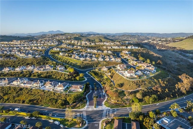 2107 Camino Laurel, San Clemente, CA 92673 - aerial view of property's location with a mountainous background and nearby suburban area