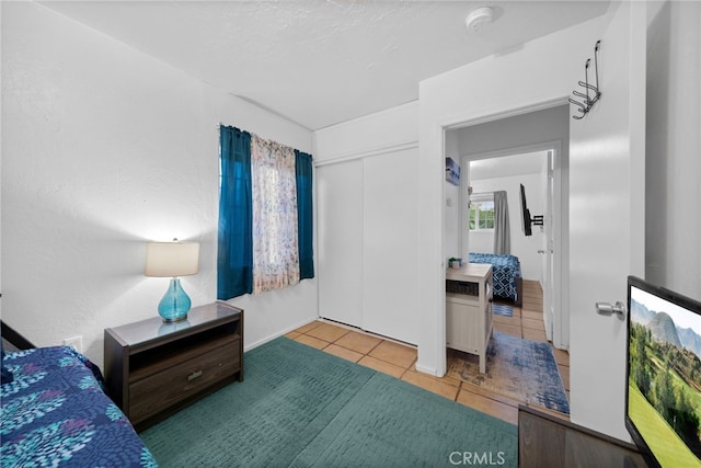 23755 Goetz Dr, Menifee, CA 92587 - tiled bedroom featuring a closet