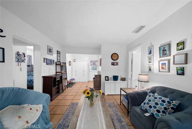 23755 Goetz Dr, Menifee, CA 92587 - living room with visible vents and light tile patterned floors