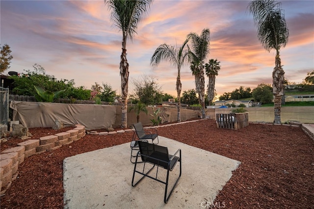 23755 Goetz Dr, Menifee, CA 92587 - patio terrace at dusk with fence