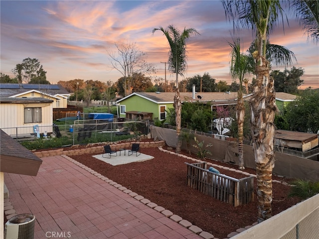 23755 Goetz Dr, Menifee, CA 92587 - exterior space featuring a patio area and a fenced backyard