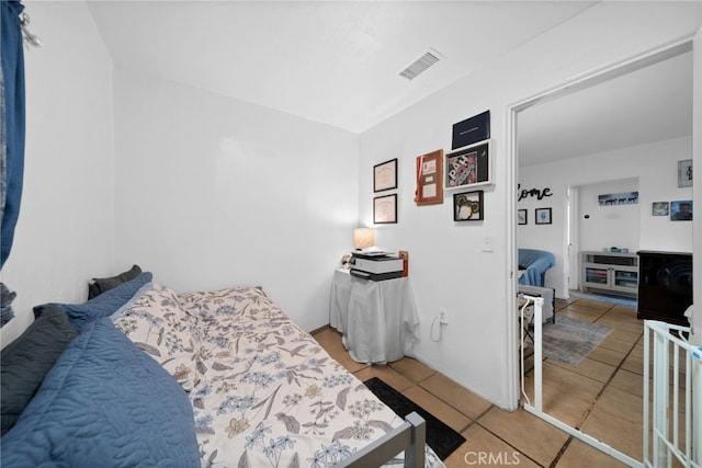 23755 Goetz Dr, Menifee, CA 92587 - bedroom featuring tile patterned flooring and visible vents