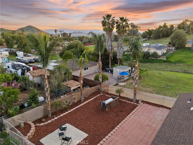 23755 Goetz Dr, Menifee, CA 92587 - aerial view at dusk featuring a mountain view