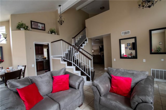 1284 William Mcgrath St, Colton, CA 92324 - living room featuring high vaulted ceiling, a chandelier, stairway, tile patterned flooring, and beamed ceiling