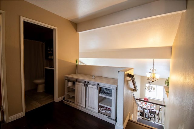 1284 William Mcgrath St, Colton, CA 92324 - kitchen with a chandelier, dark wood finished floors, and light countertops