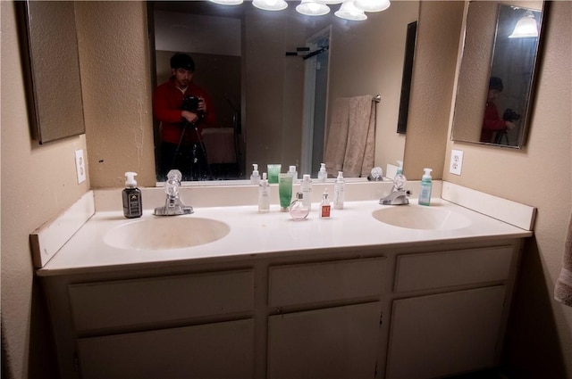 1284 William Mcgrath St, Colton, CA 92324 - bathroom with double vanity and a textured wall