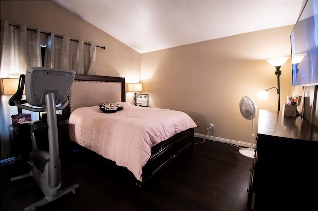 1284 William Mcgrath St, Colton, CA 92324 - bedroom featuring lofted ceiling, dark wood-style floors, and baseboards