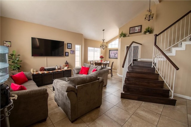 1284 William Mcgrath St, Colton, CA 92324 - tiled living area with stairs, a chandelier, baseboards, and high vaulted ceiling