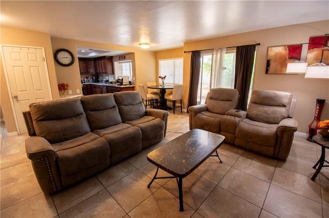 1284 William Mcgrath St, Colton, CA 92324 - living area featuring light tile patterned floors and baseboards