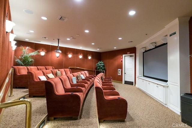 home theater room featuring visible vents, recessed lighting, and light carpet