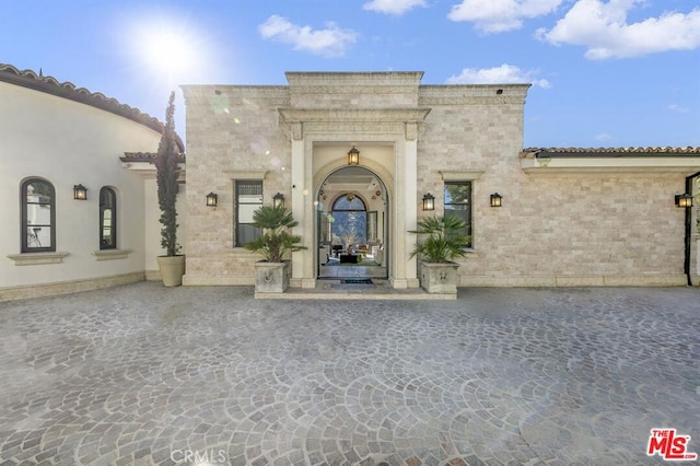 mediterranean / spanish-style house featuring stucco siding