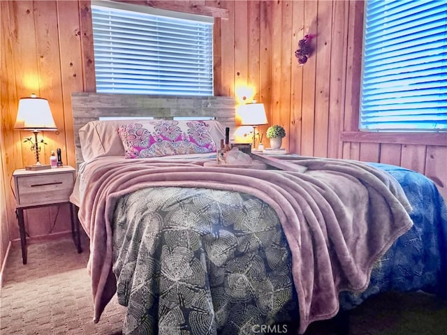bedroom with wood walls