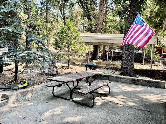 surrounding community with a patio