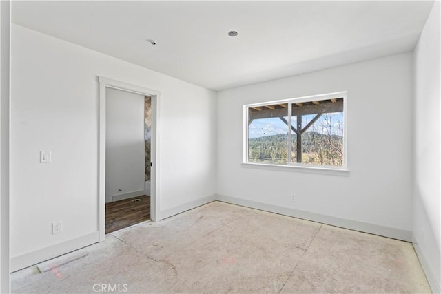 unfurnished bedroom with baseboards