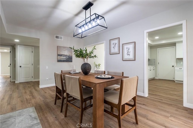 9128 Gerald Ave, Northridge, CA 91343 - dining room with light wood-style floors, baseboards, and recessed lighting