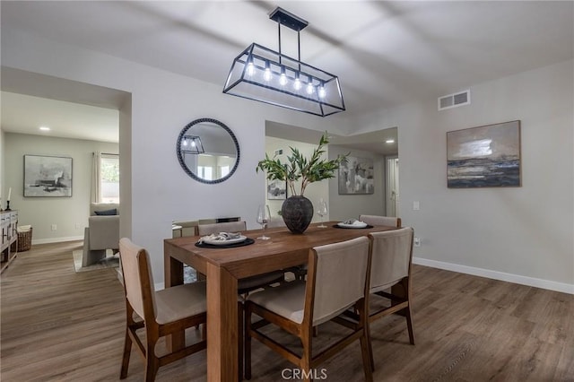 9128 Gerald Ave, Northridge, CA 91343 - dining area with wood finished floors and baseboards