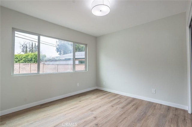 9128 Gerald Ave, Northridge, CA 91343 - spare room featuring light wood-style flooring and baseboards