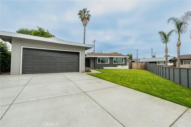 9128 Gerald Ave, Northridge, CA 91343 - single story home featuring a garage, driveway, and stucco siding