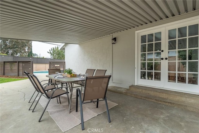 9128 Gerald Ave, Northridge, CA 91343 - view of patio featuring french doors and outdoor dining space