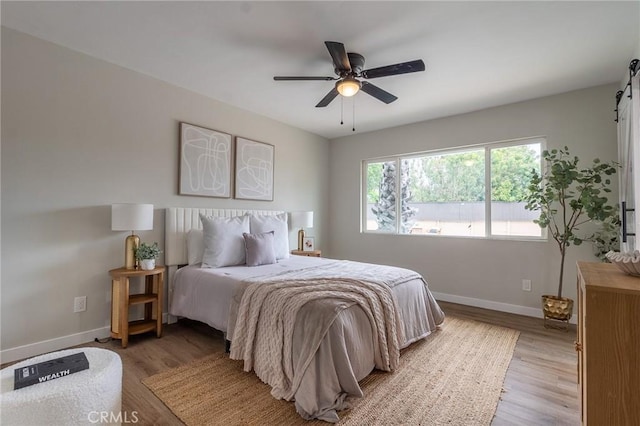 9128 Gerald Ave, Northridge, CA 91343 - bedroom featuring light wood-style flooring, baseboards, and a ceiling fan