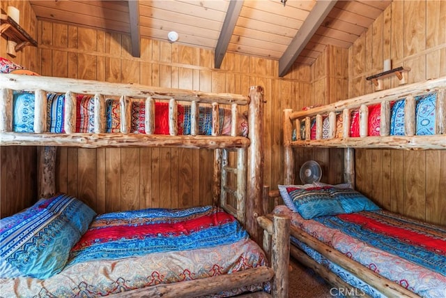 26375 Augusta Dr, Lake Arrowhead, CA 92352 - bedroom featuring wood ceiling, wood walls, and vaulted ceiling with beams