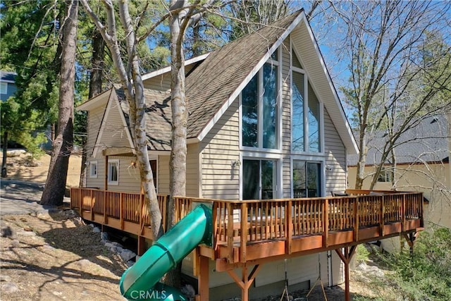 26375 Augusta Dr, Lake Arrowhead, CA 92352 - rear view of house with a shingled roof and a deck
