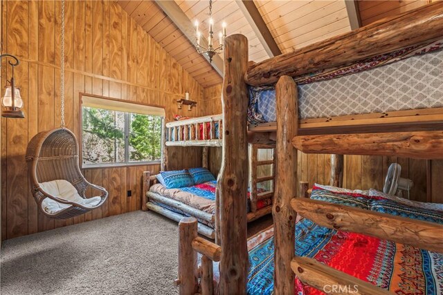 26375 Augusta Dr, Lake Arrowhead, CA 92352 - carpeted bedroom featuring wooden walls, vaulted ceiling with beams, a chandelier, and wood ceiling
