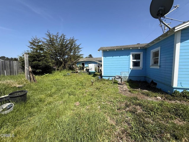 view of yard with fence