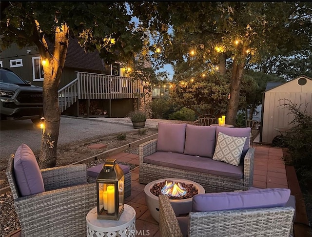 27482 Matterhorn Dr, Lake Arrowhead, CA 92352 - view of patio with an outdoor living space with a fire pit, a wooden deck, stairway, and a storage shed