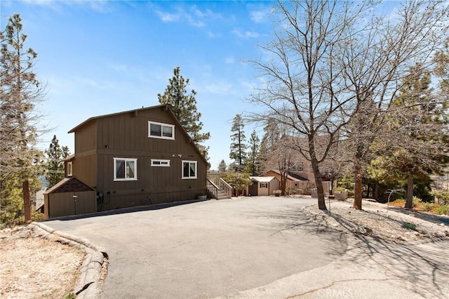 27482 Matterhorn Dr, Lake Arrowhead, CA 92352 - view of home's exterior featuring a storage shed