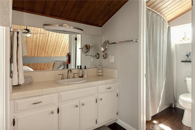 27482 Matterhorn Dr, Lake Arrowhead, CA 92352 - bathroom with wood ceiling, lofted ceiling, vanity, wood finished floors, and curtained shower