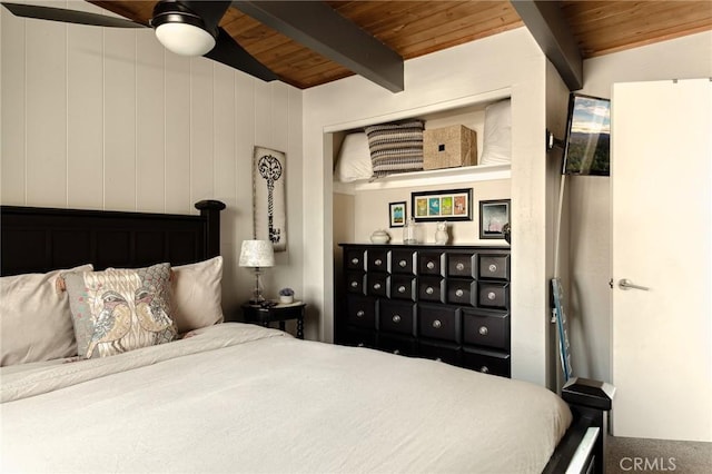 27482 Matterhorn Dr, Lake Arrowhead, CA 92352 - bedroom with a wooden ceiling with exposed beams, a ceiling fan, and carpet floors