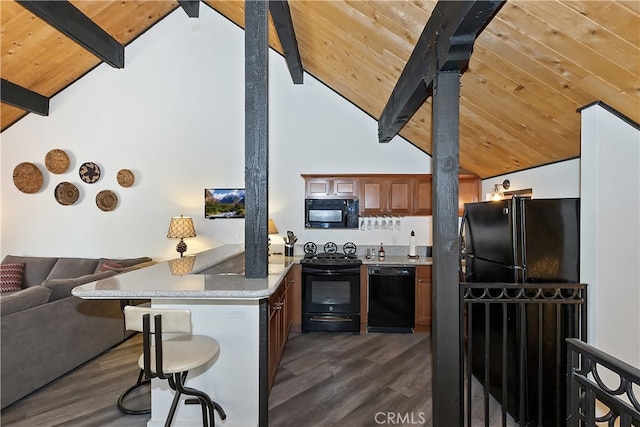 41935 Switzerland Dr Unit 100, Big Bear Lake, CA 92315 - kitchen featuring beamed ceiling, a peninsula, black appliances, wood ceiling, and open floor plan